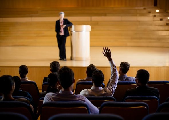 female-business-executive-giving-speech_107420-63791